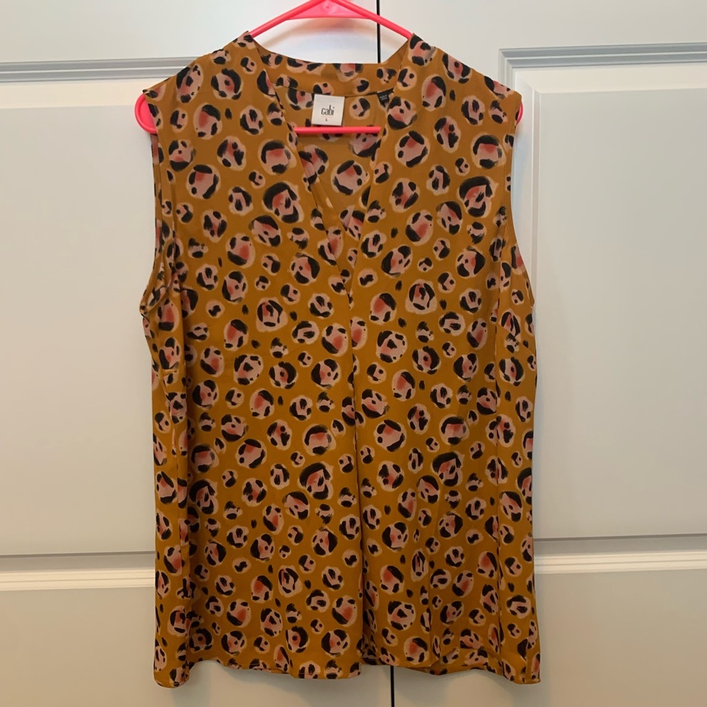 Beautiful colors in this blouse. Blouse is now too big.